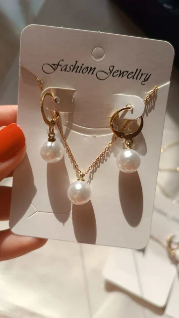 این نیم ست مرواریدش سفید صدفی